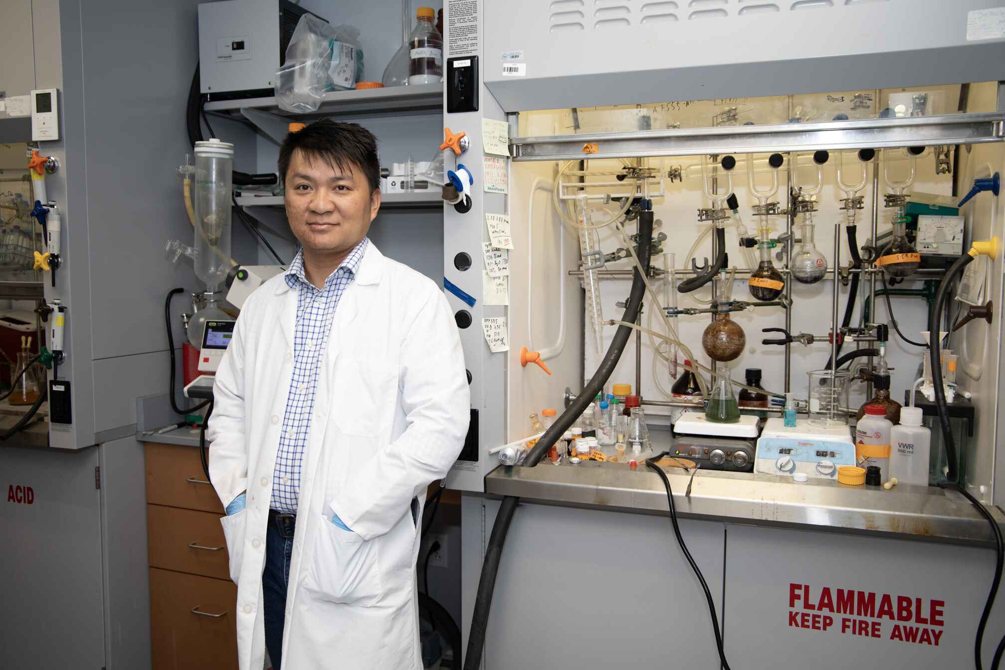 man wearing a lab coat in a lab