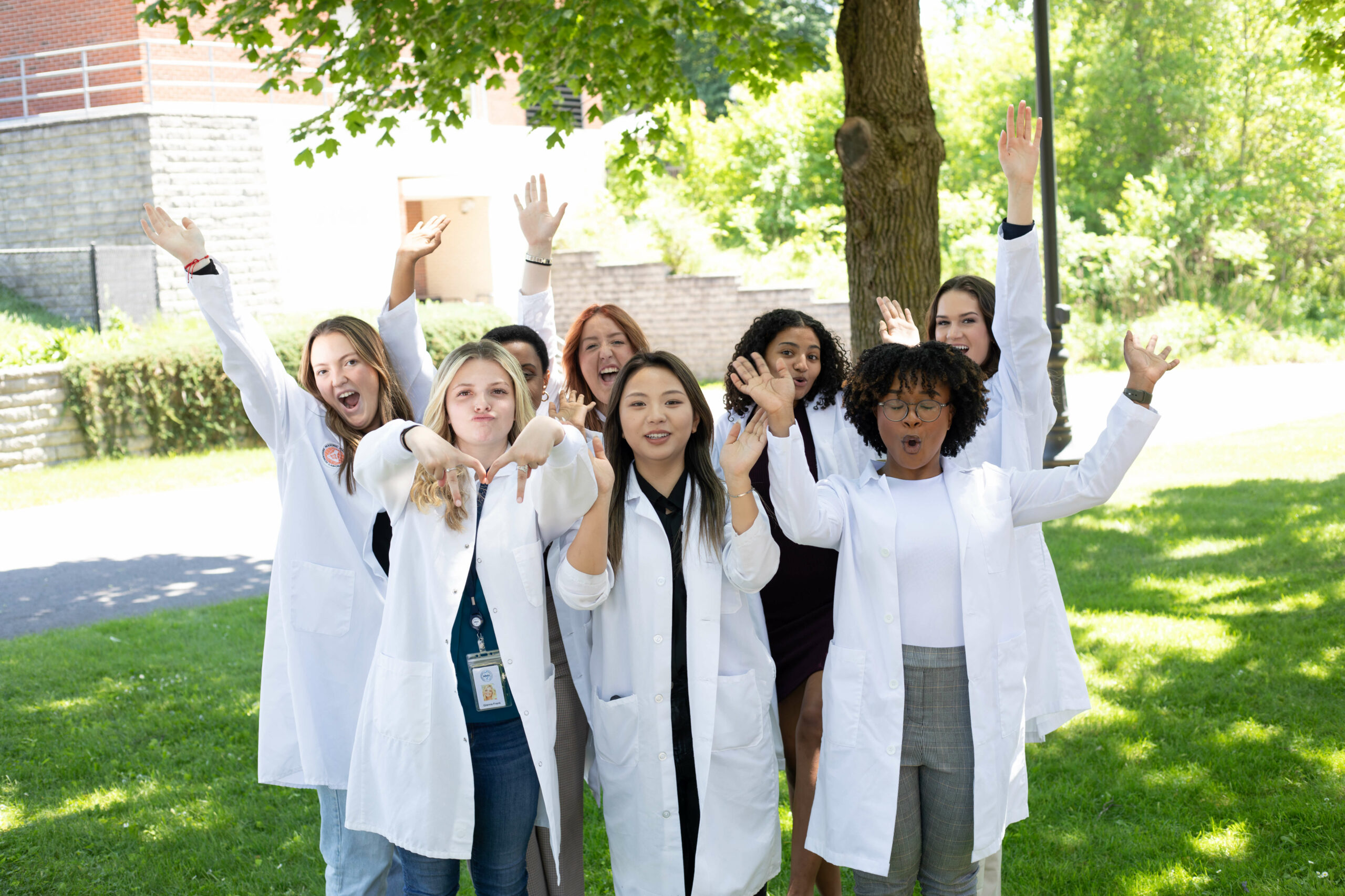 Group of summer fellows cheering