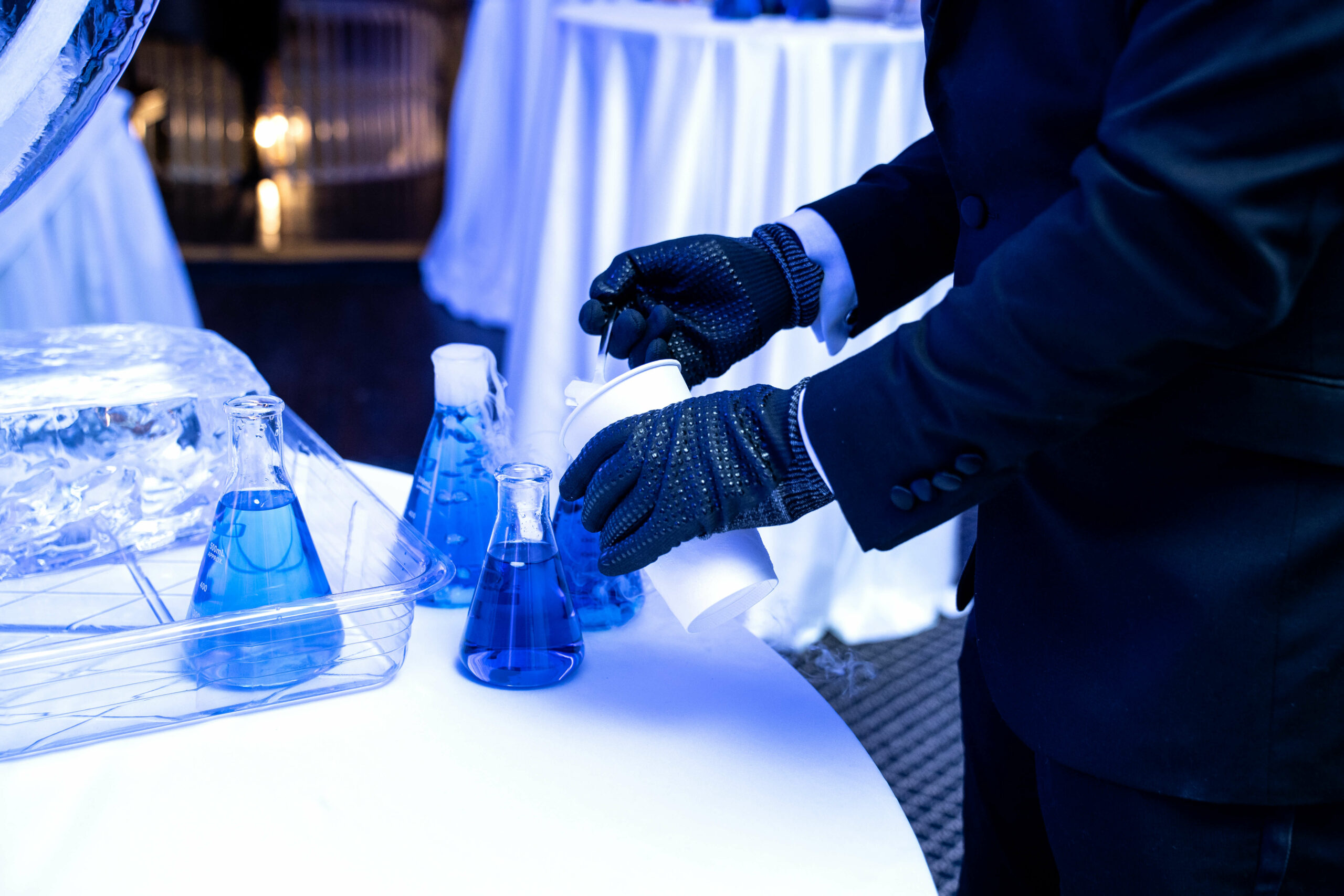 Dry ice being put into beakers