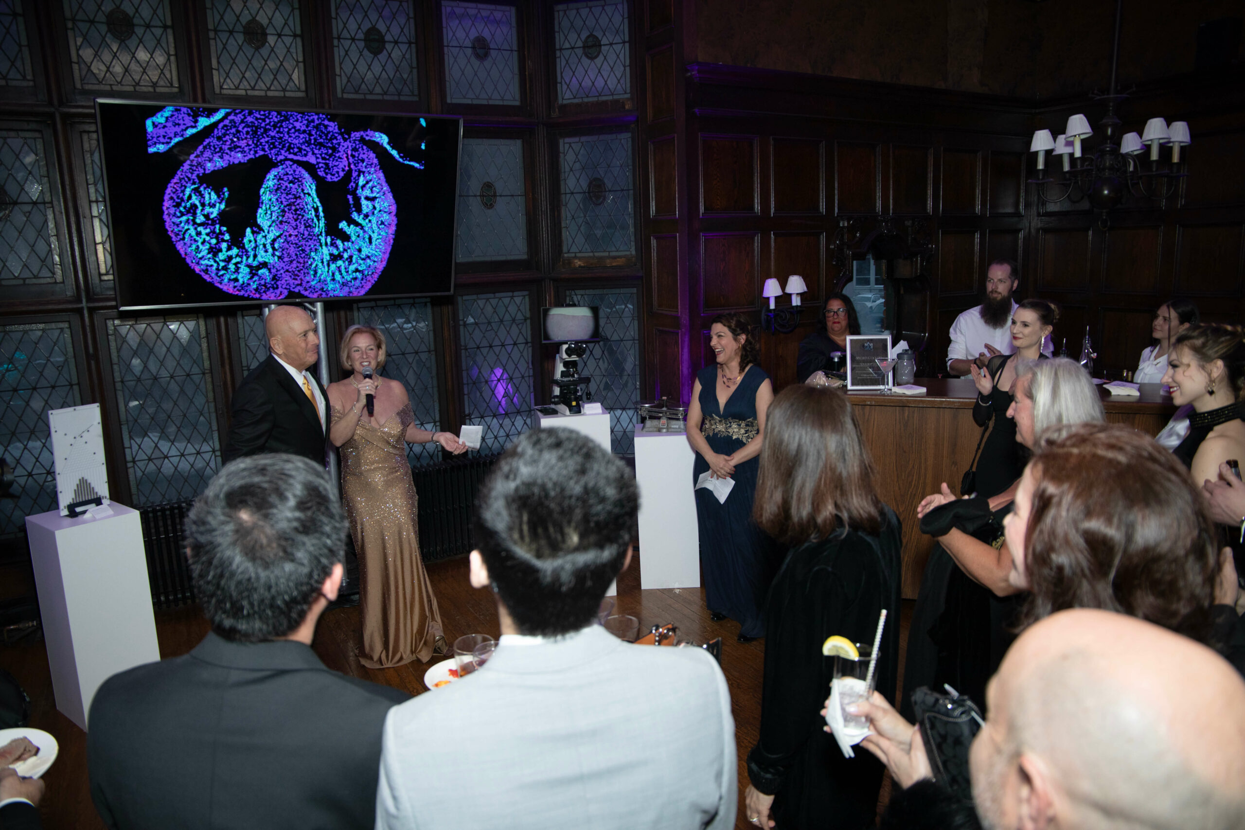 Jackie and John Romano giving a toast at the 1958 Gala