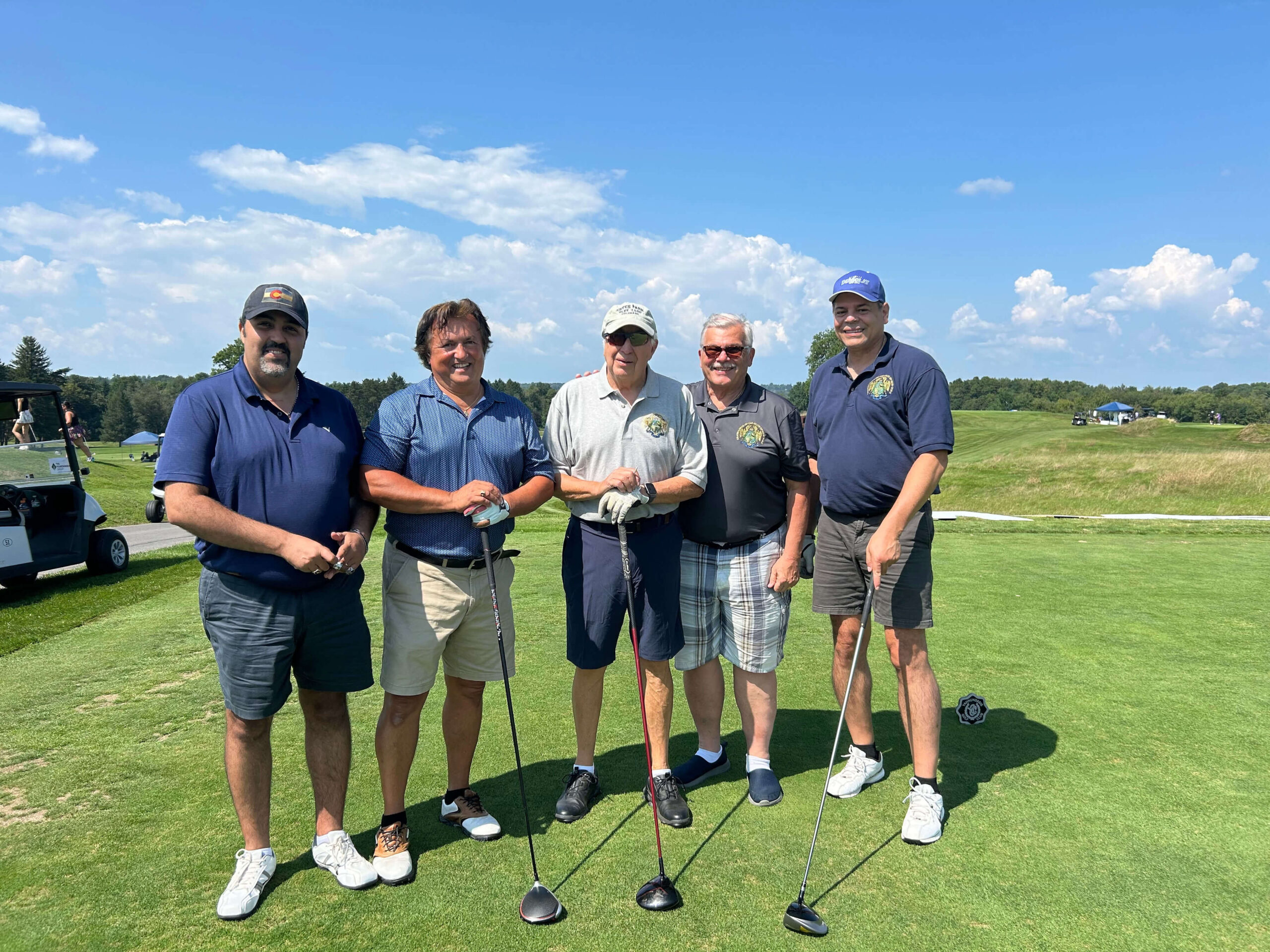 golfers posing for group shot