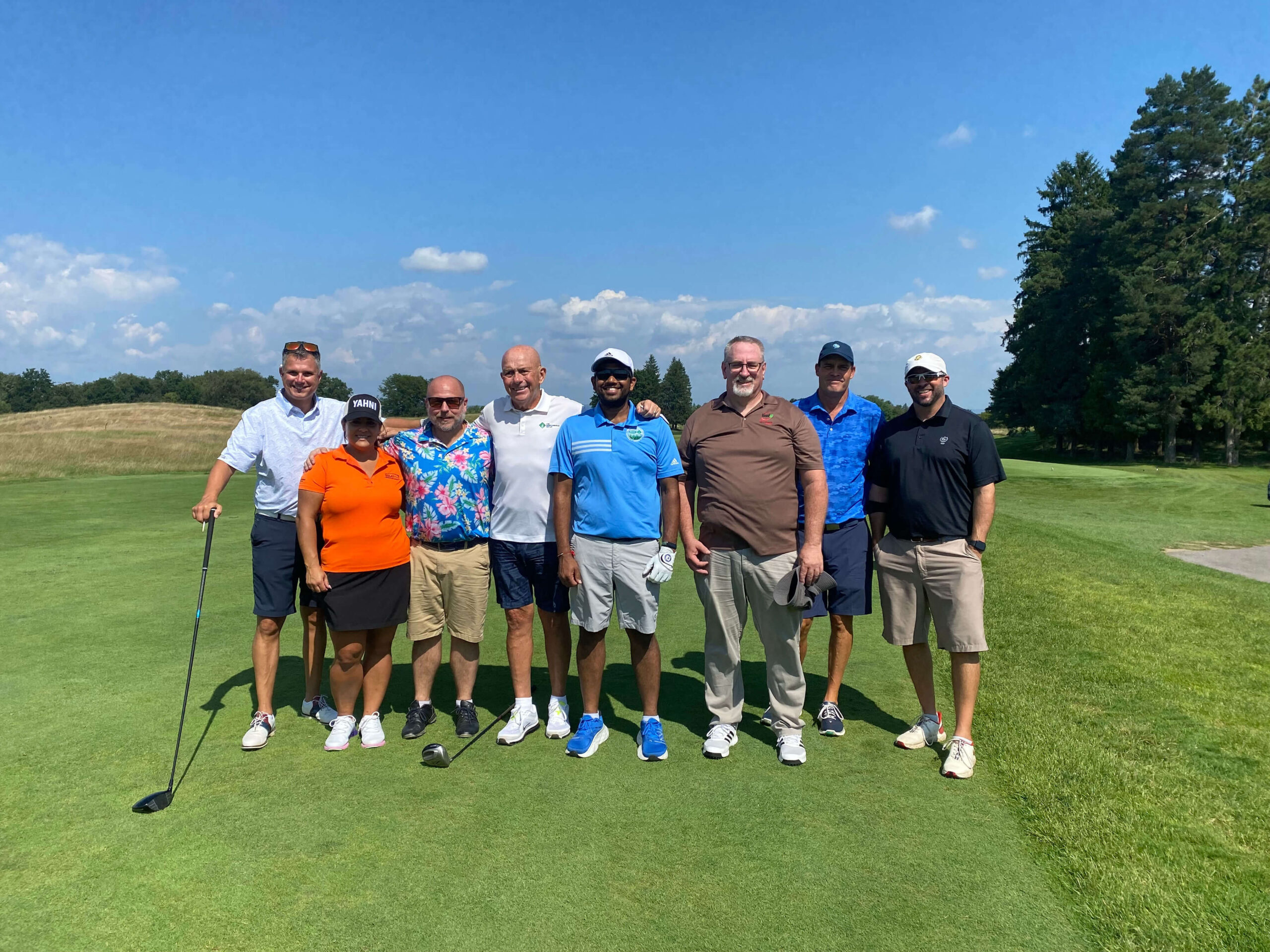 golfers posing for group shot