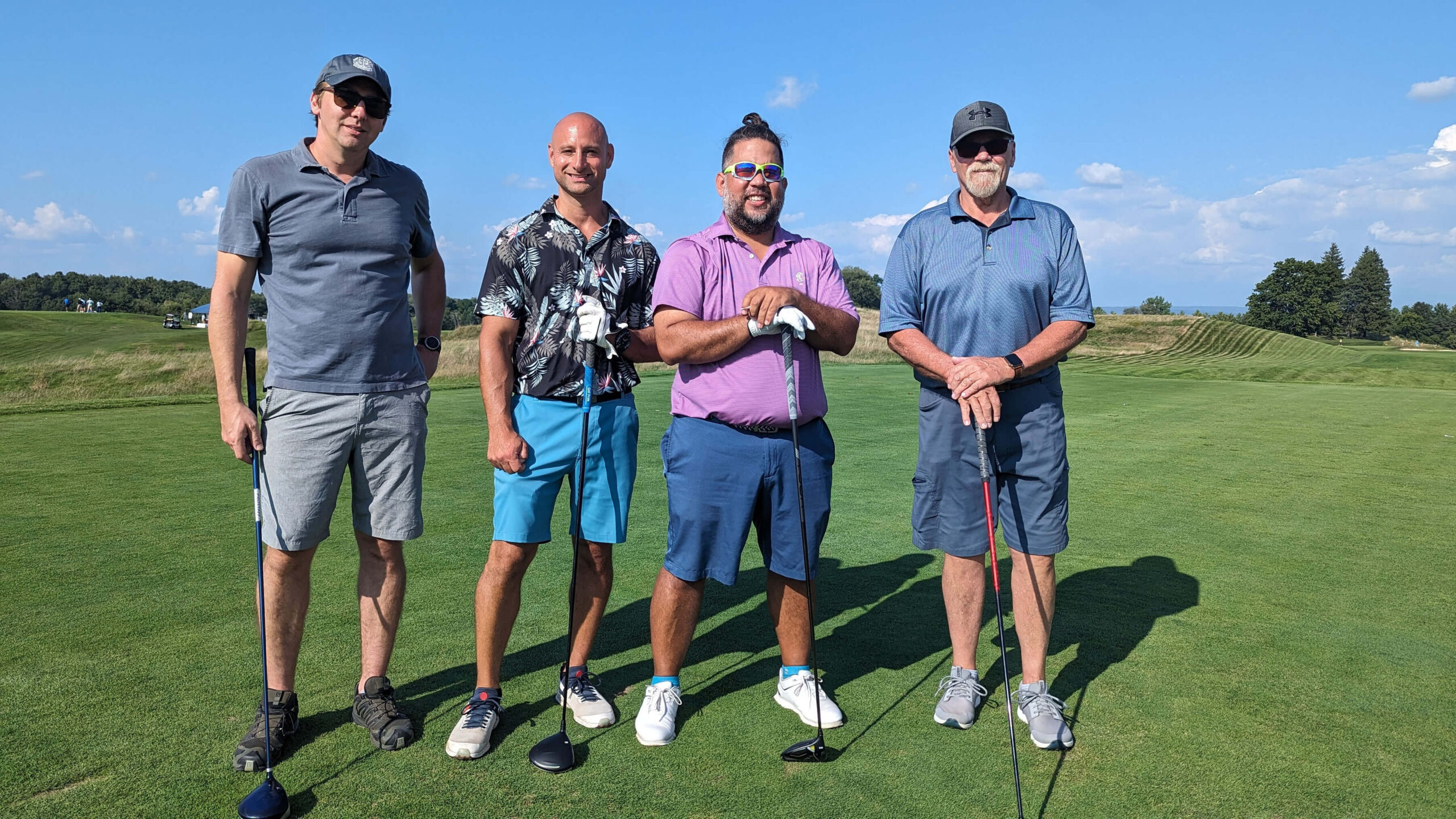 golfers posing for group shot