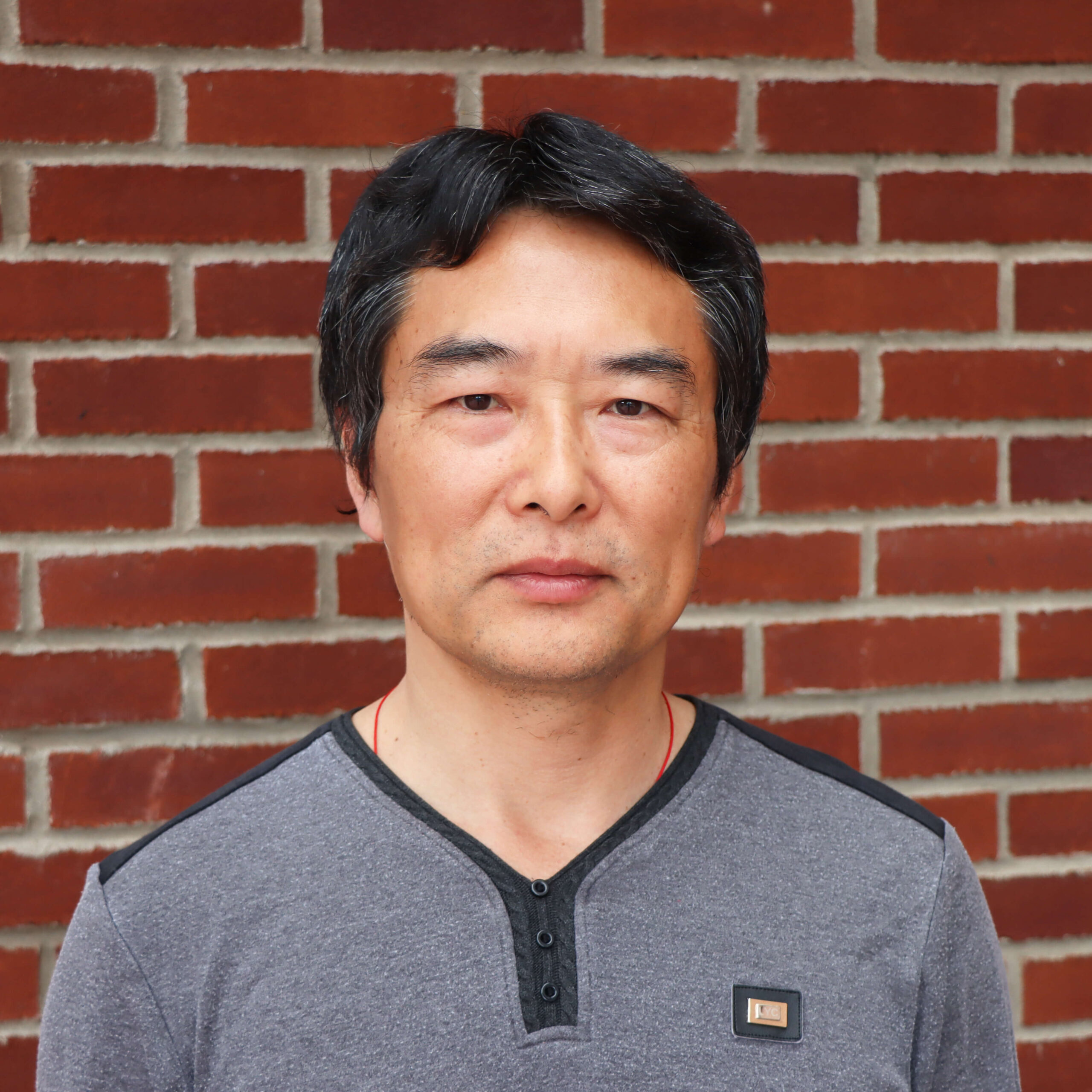 Greg Wang Ph.D. Headshot