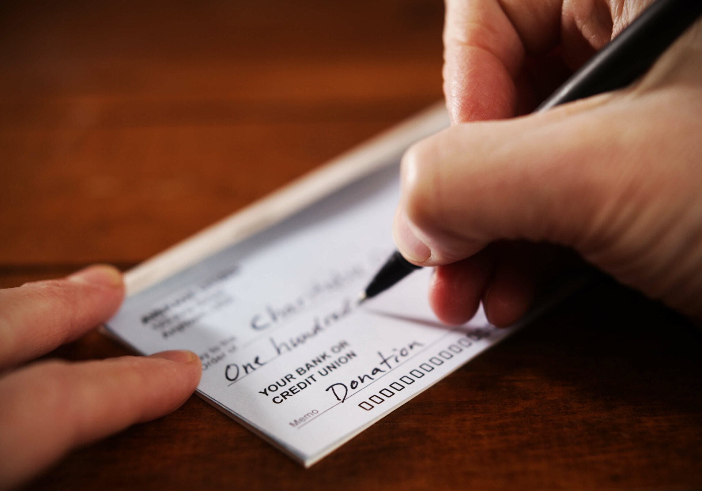 Person signing a check